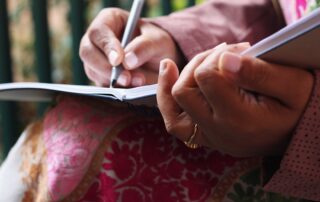 close up of someone utilizing narrative therapy